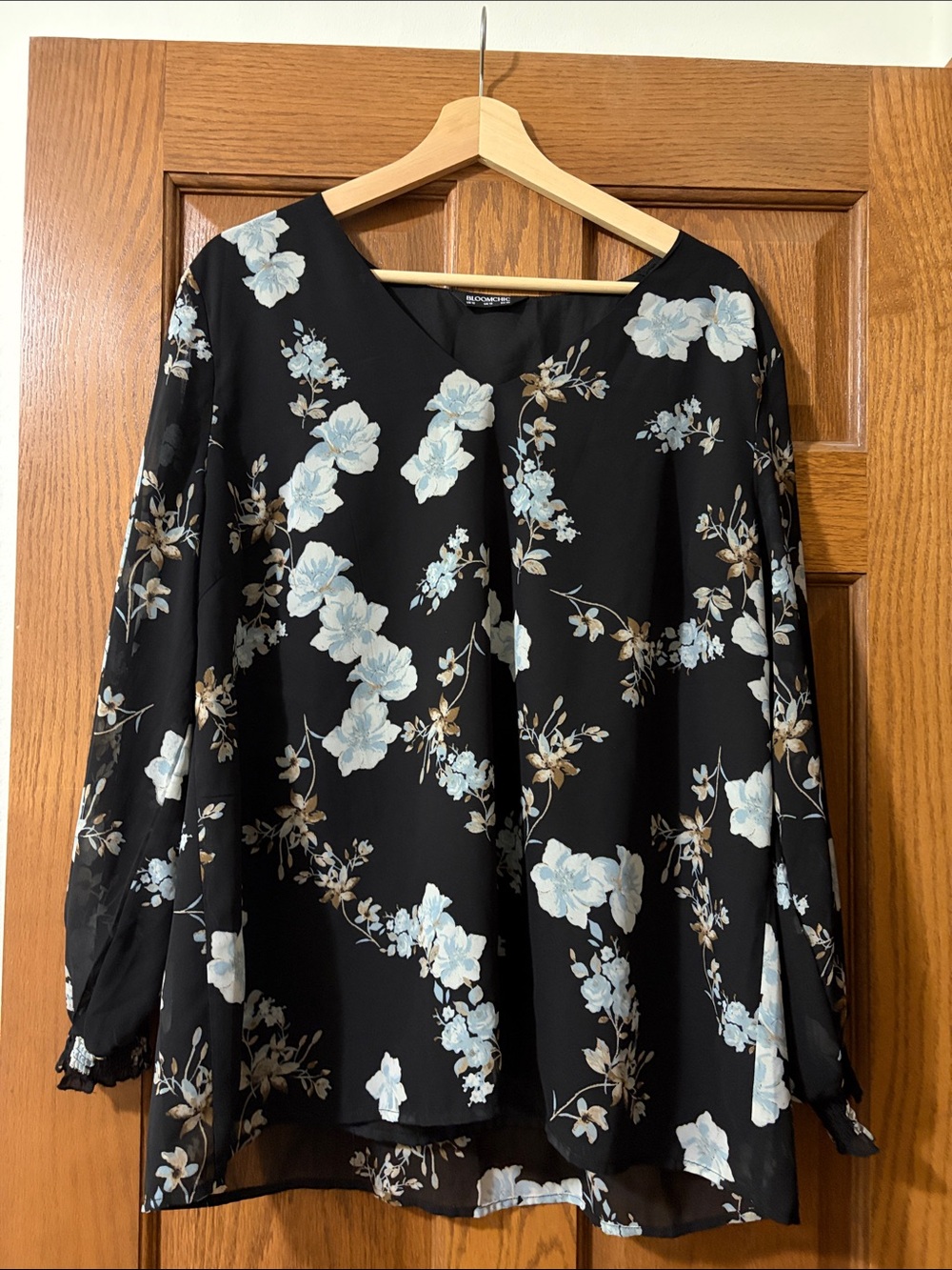 BloomChic Black Floral V-Neck Blouse with Light Blue and Tan Flowers